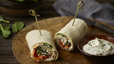 TORTILLA WRAP with spicy hummus and coleslaw